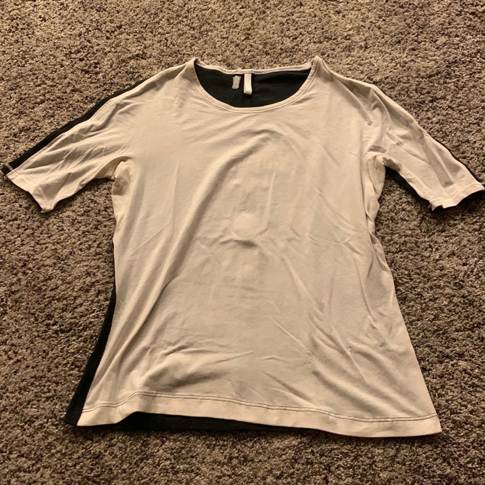 Lululemon brand, size 4, eggshell color front and a charcoal black back
